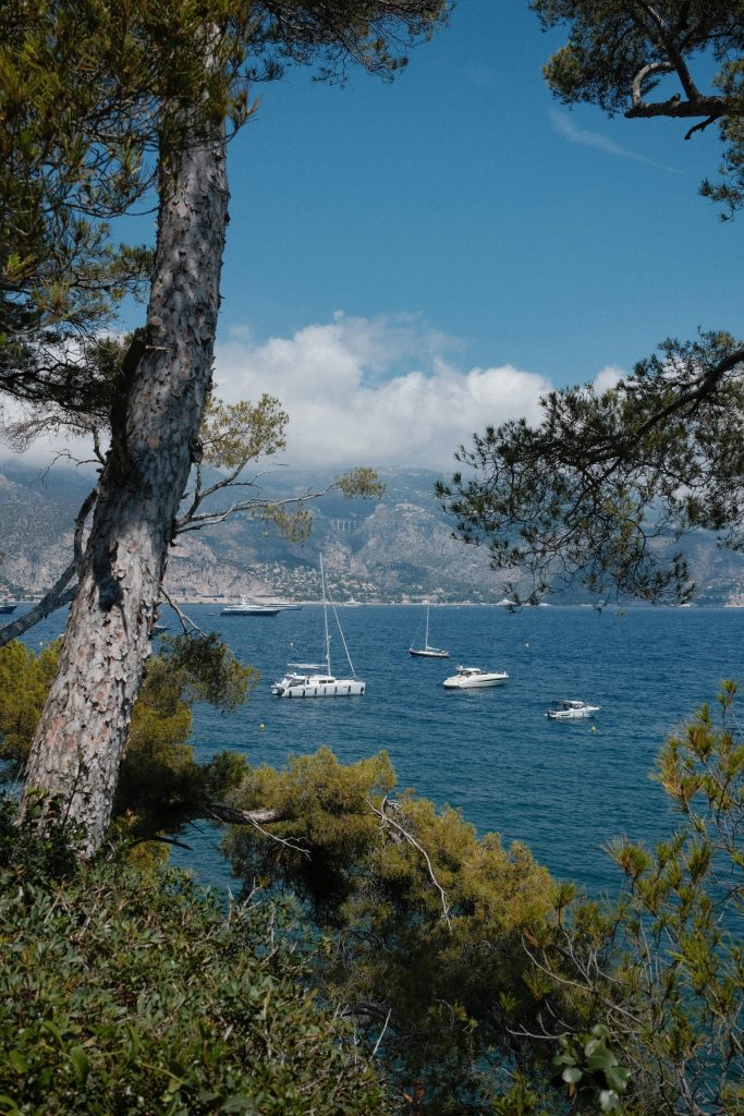 Scenic view of sailboats in Saint-Jean-Cap-Ferrat, France on a sunny day.