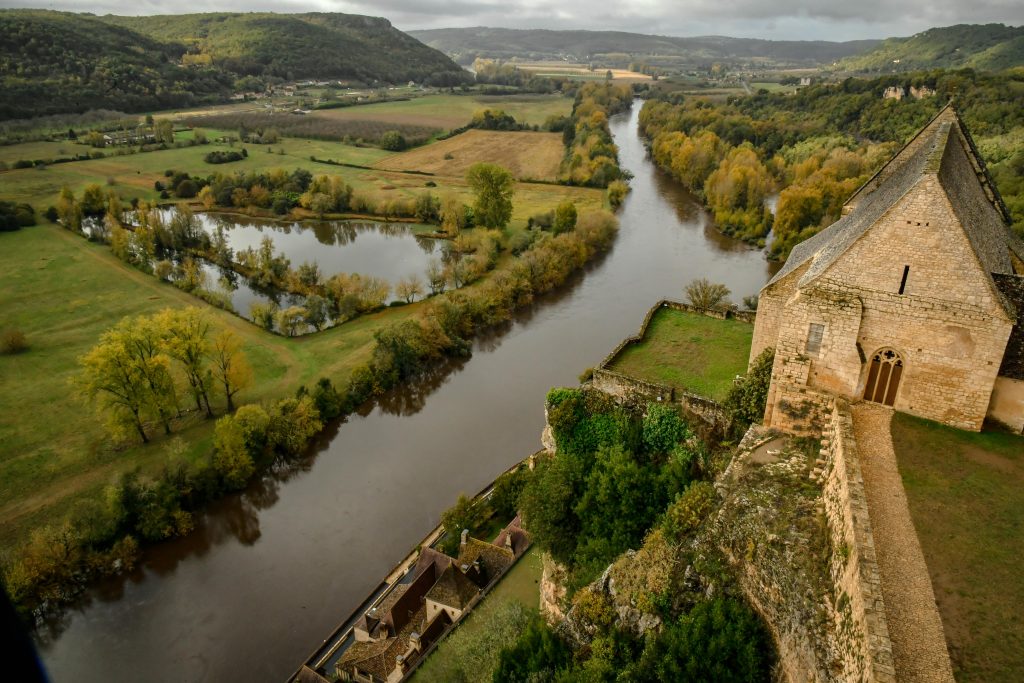 Scenic view of Chateau de Beynac and river in autumn, France.