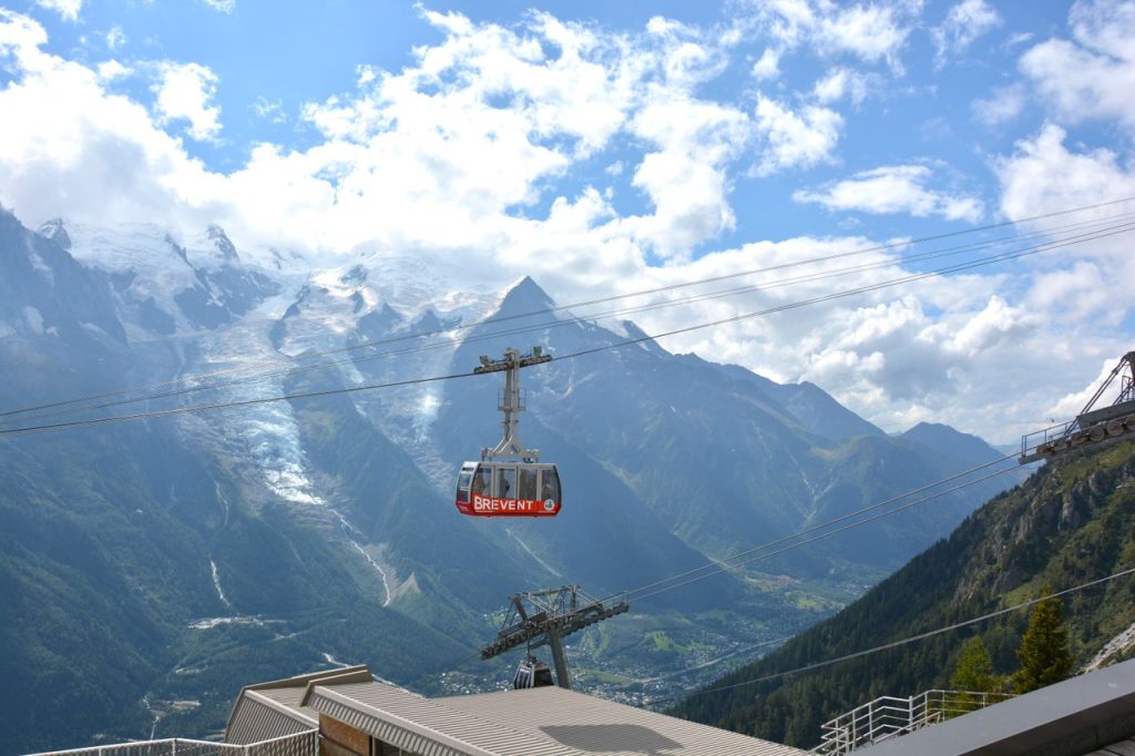 Breathtaking view of cable car above Mont Blanc with stunning alpine landscape.
